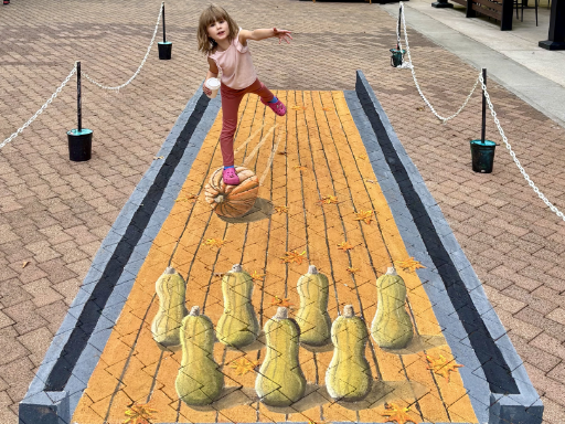 Halloween pumpkin bowling 3D chalk art scene